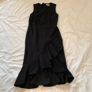 Long black Calvin Klein dress ruffle at bottom, size 10, zips in back
